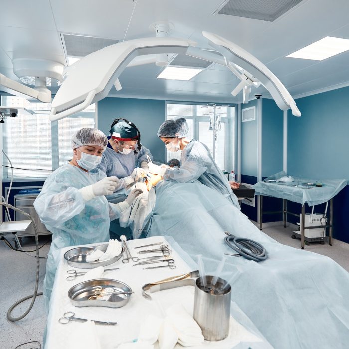 A modern operating room, surgeons and doctors doing an oncological operation, modern medicine, a